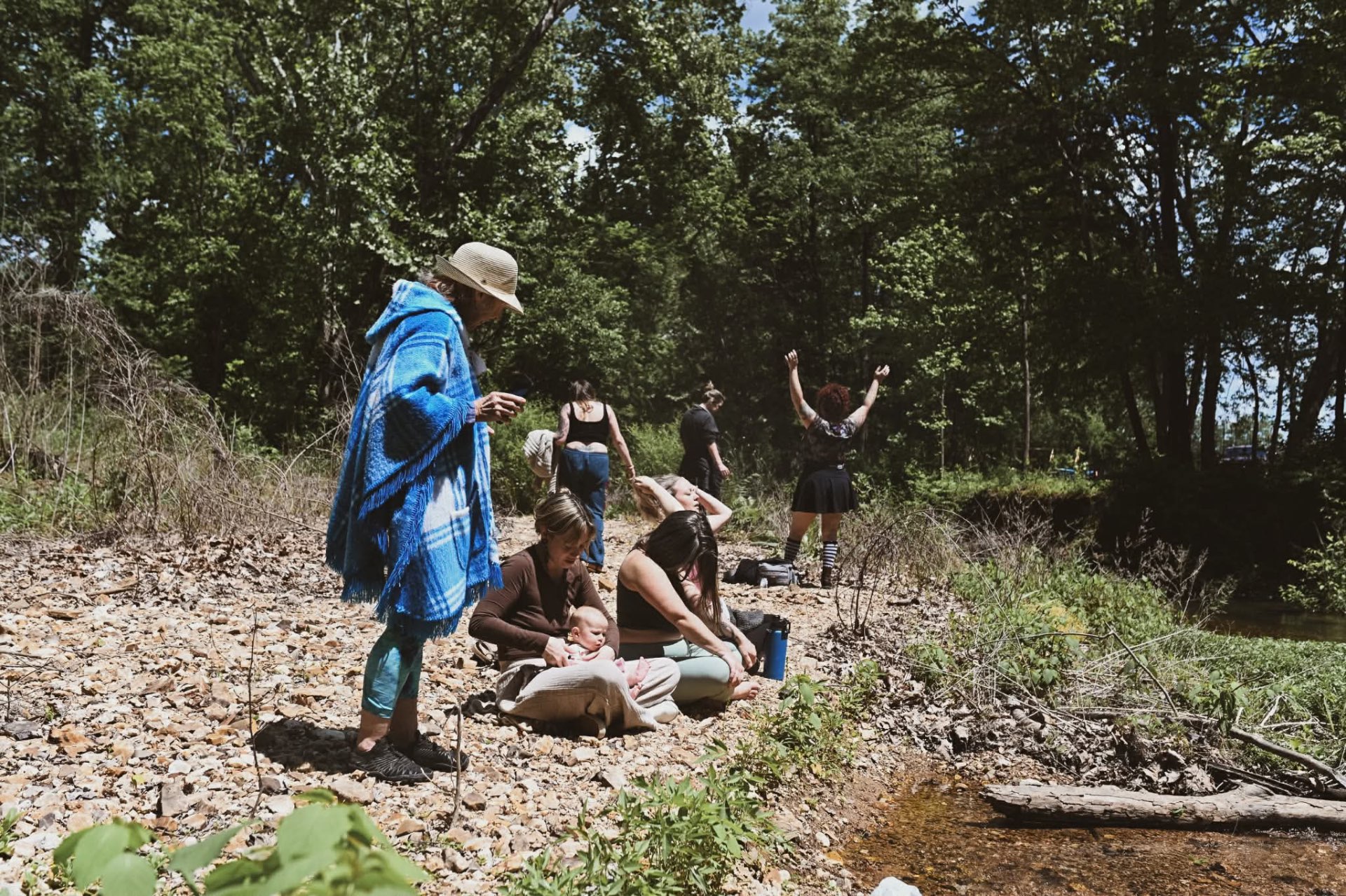 Sisters gathering by the creek